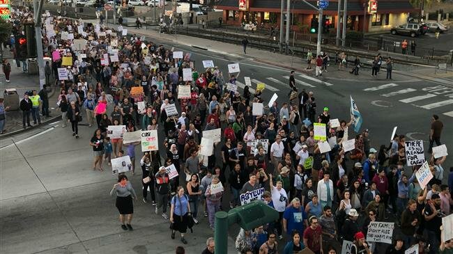 Ribuan Orang di Seluruh AS Protes Perlakuan Trump Terhadap Migran